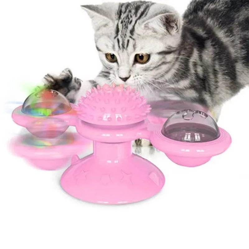 Interactive windmill cat toy in pink with spinning components, engaging for playful cats