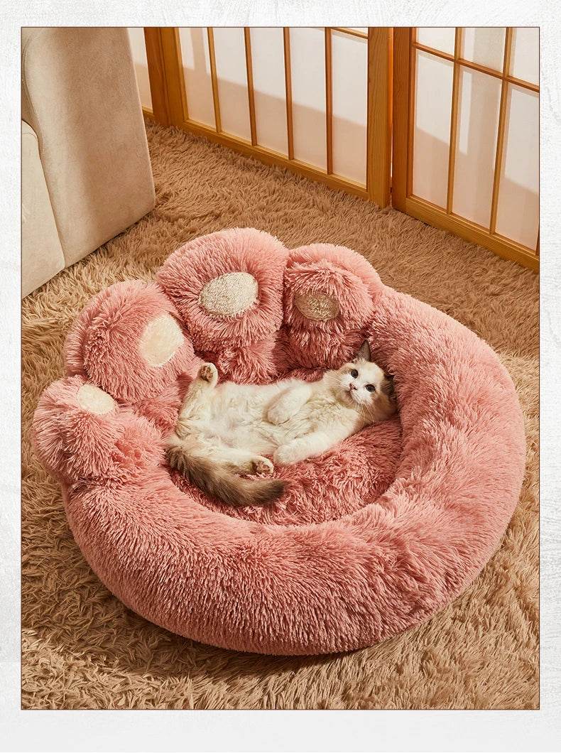 Large fluffy dog bed in pink with soft plush fabric for ultimate pet comfort and relaxation