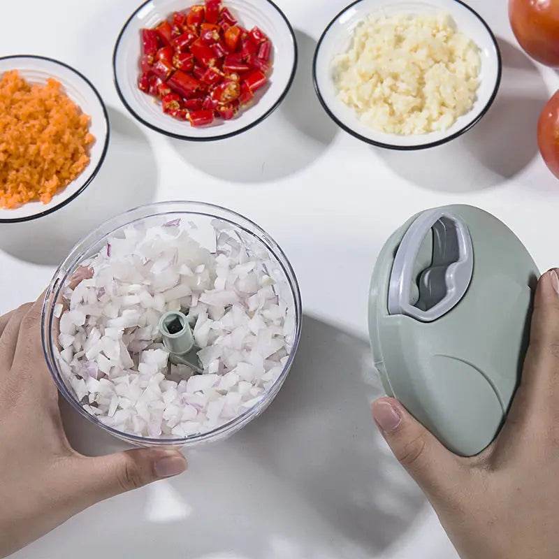 Fitzsi Essentials meat and garlic mincer with diced onions and chopped ingredients for meal preparation