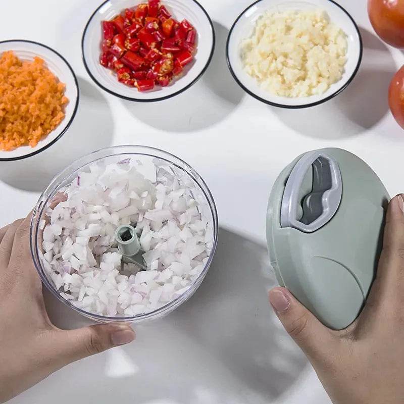 Fitzsi Essentials meat and garlic mincer with chopped onions and vegetables ready for meal preparation