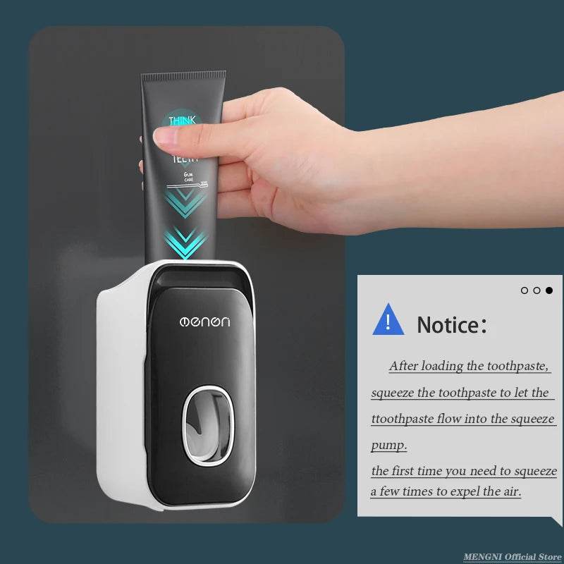 Fitzsi Essentials hands-free toothpaste dispenser in use with a user loading a toothpaste tube