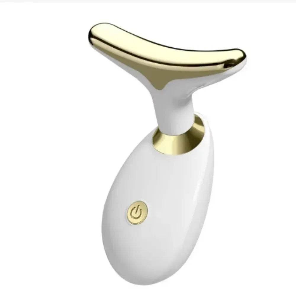 Fitzsi Essentials portable face massager with ergonomic design and gold accents for rejuvenating facial care