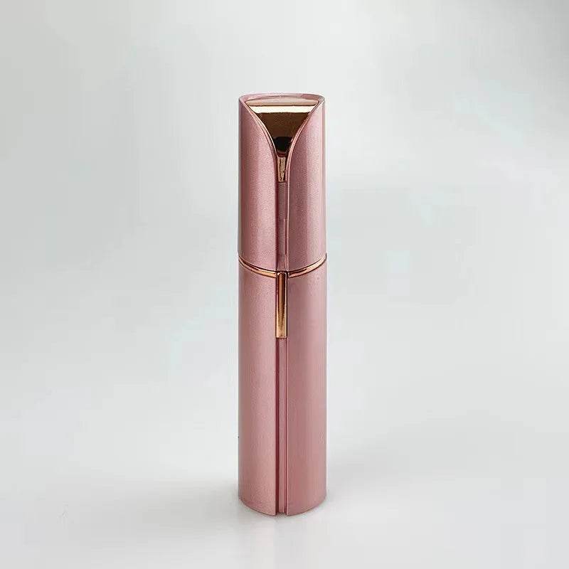 Fitzsi Essentials portable facial hair remover in sleek rose gold design for easy on-the-go use
