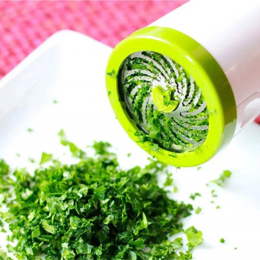 Fitzsi Essentials stainless steel spice grinder with a vibrant green design for chopping herbs and spices