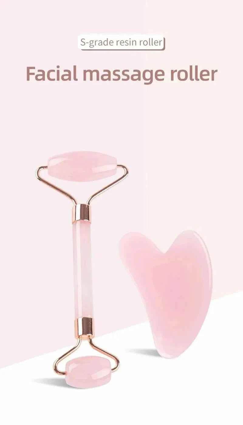 Fitzsi Essentials face neck massager roller in pink with a heart shaped jade design for facial rejuvenation