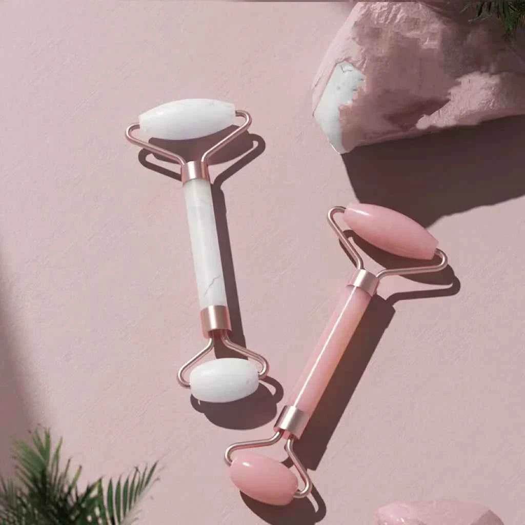 Fitzsi Essentials face neck massager roller set featuring pink and white jade rollers for rejuvenating skincare