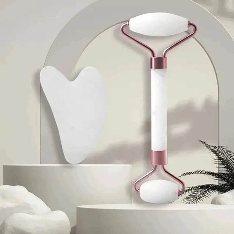 Fitzsi Essentials face neck massager roller in white with rose gold accents for soothing facial treatments