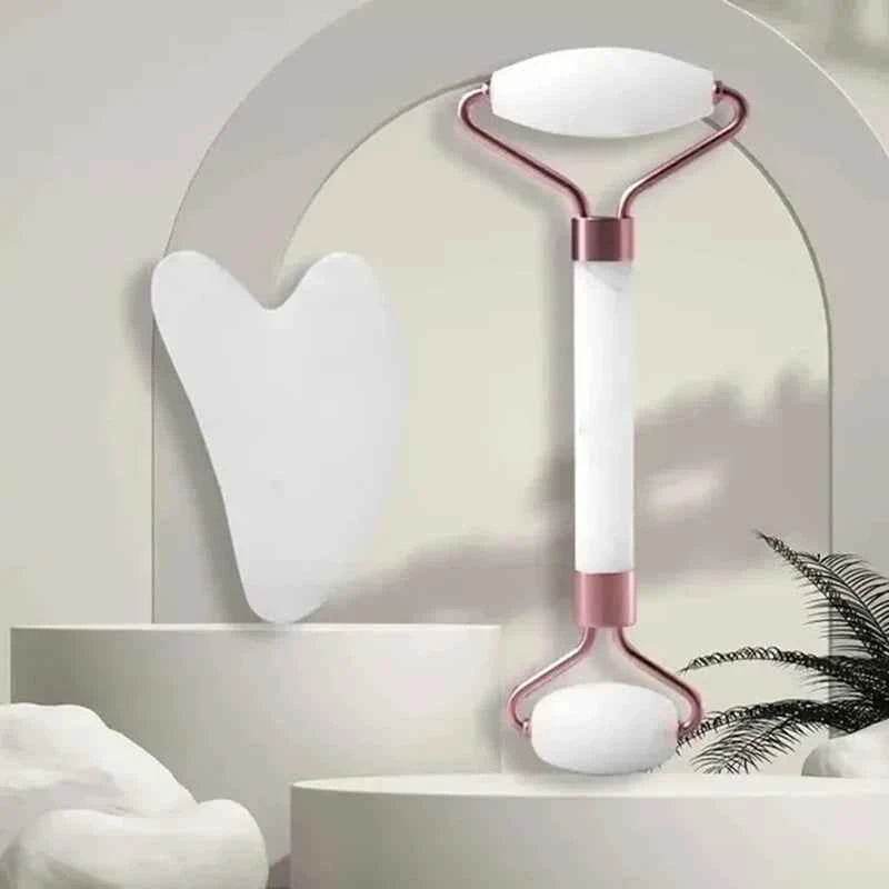 Fitzsi Essentials face neck massager roller with white and rose gold design for relaxing facial treatments