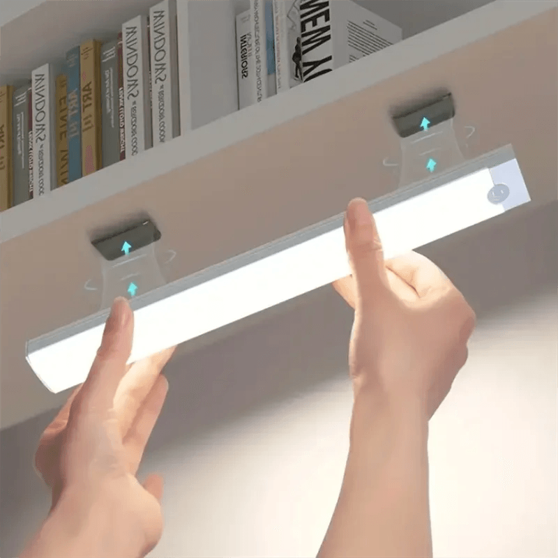 Fitzsi Essentials intelligent sensing light strip mounted under a shelf, providing illumination with motion detection