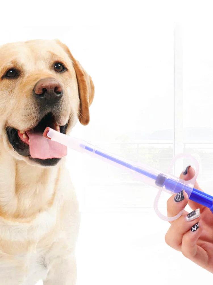 Fitzsi Essentials pet pill syringe gun being used on a dog to administer medication effectively
