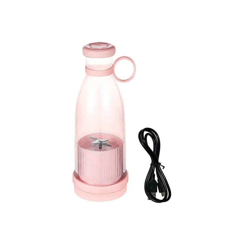 Fitzsi Essentials portable fruit juicer bottle in pink with USB charging cable for blending on the go