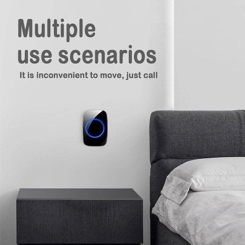 Fitzsi Essentials wireless doorbell EU plug mounted on a wall near a bedside table for easy access