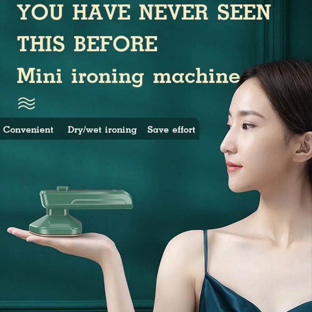 Fitzsi Essentials handheld garment steamer in green, perfect for convenient dry and wet ironing
