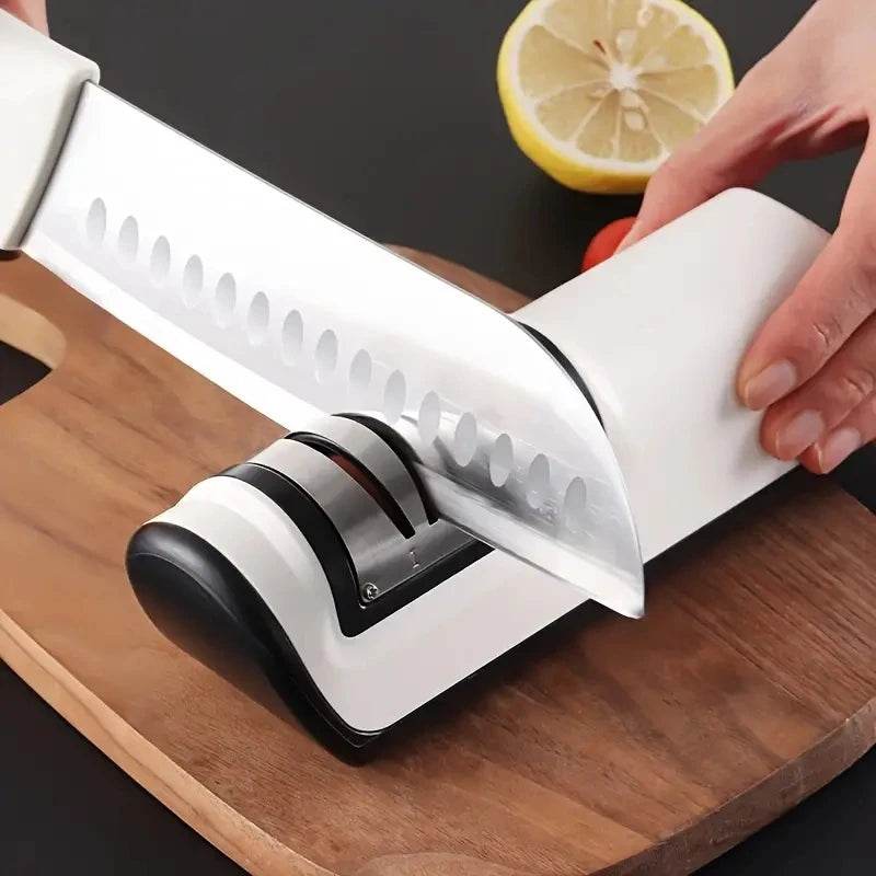 Fitzsi Essentials multifunctional sharpener gadget enhancing knife sharpness on a wooden cutting board
