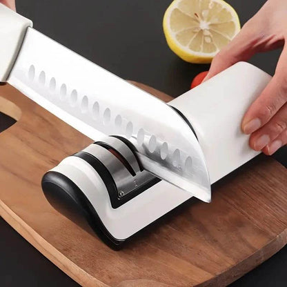Fitzsi Essentials multifunctional sharpener gadget enhancing knife sharpness on a wooden cutting board