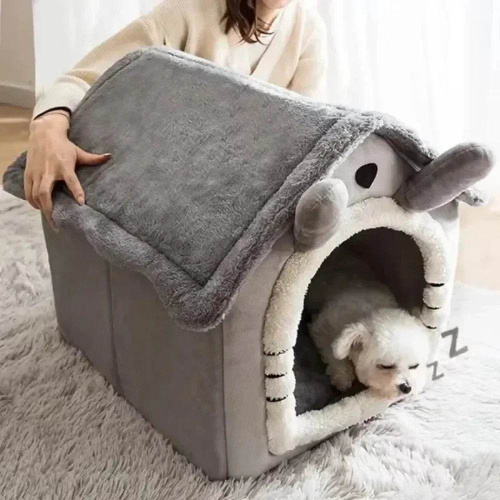 Cozy washable cat and dog bed in a house shape with soft fleece interior for pets